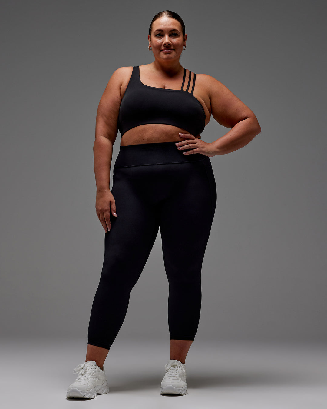 Woman wearing Fusion Ultra High-Rise 7/8 Legging Pockets - Black | Model:Jordie | Size:2XL