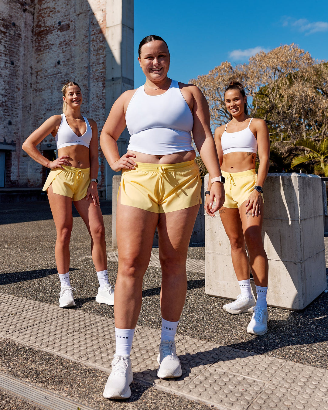 Woman wearing Accelerate 3" Run Shorts - Sunflower