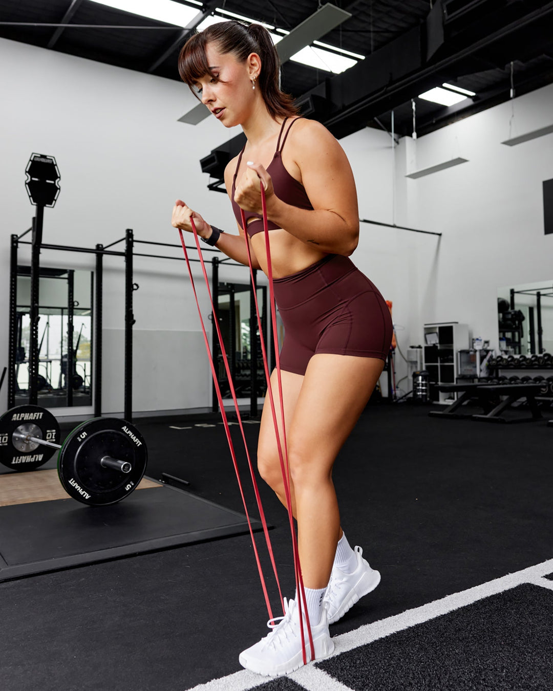Woman wearing Bend Ultra High-Rise 4" Short - Dark Cherry
