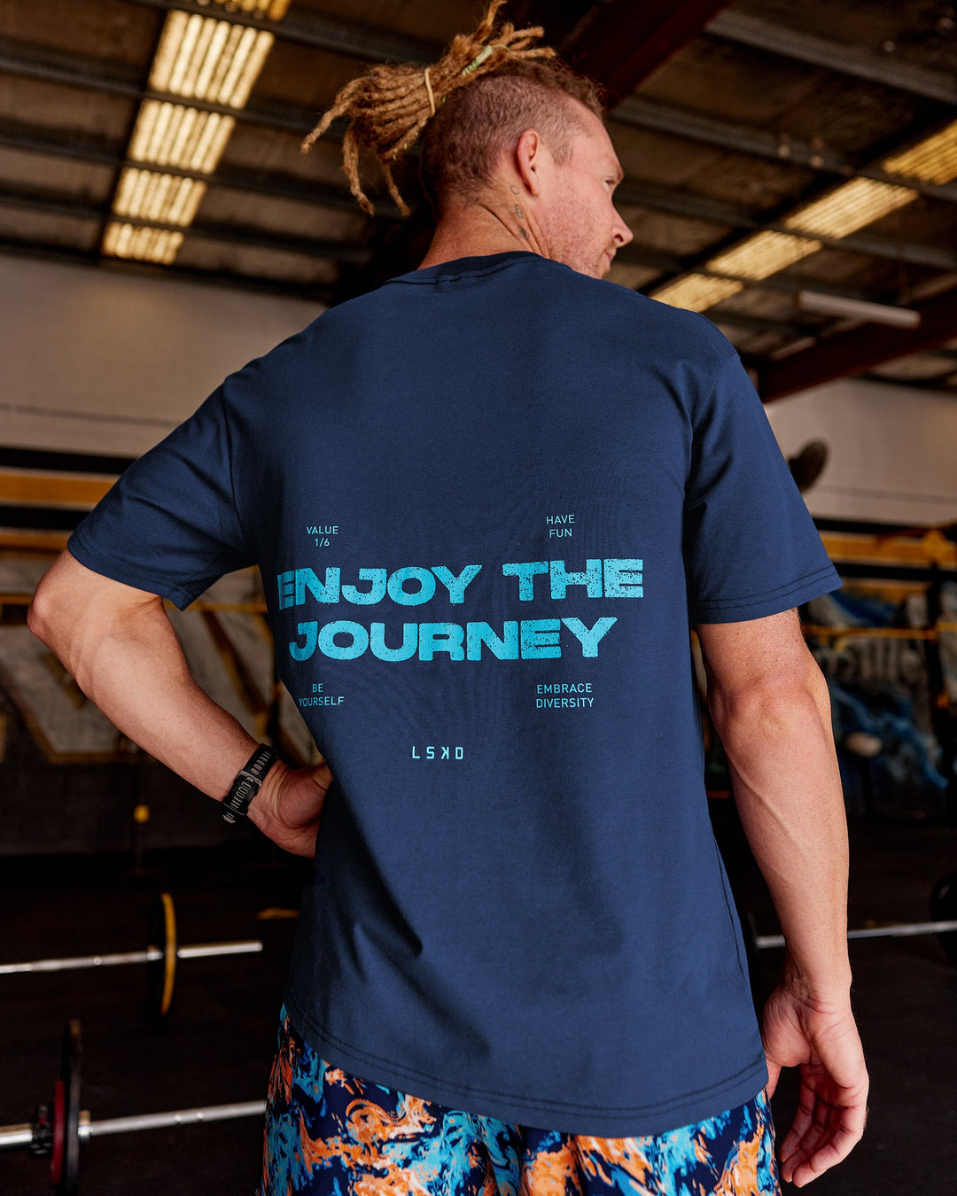 Man wearing Enjoy the Journey Value Series FLXCotton Tee Oversize - Future Navy-Blue Atoll | Model:James | Size:L