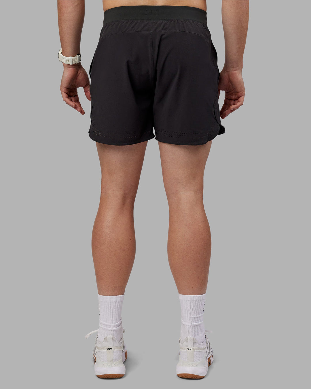 Man wearing Lift 6" Short - Pirate Black | Model:Tom | Size:L