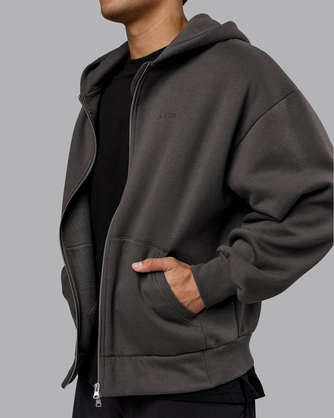 Man wearing MVP Zip Through Oversized Hoodie - Dark Storm | Model:Kaelyb | Size:L