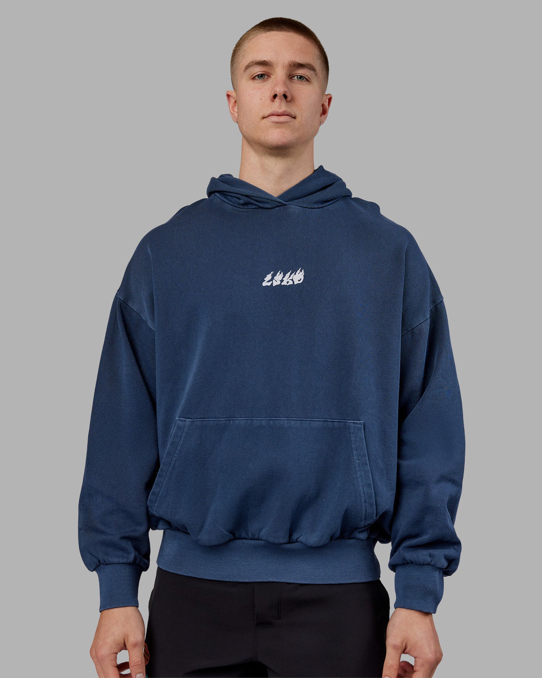 Man wearing NY25 Washed Oversized Hoodie - Future Navy-Ultra Orange | Model:Tom | Size:L