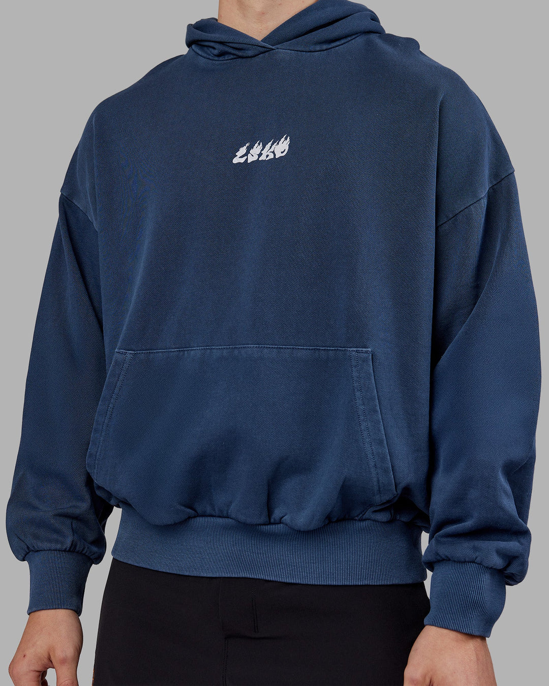 Man wearing NY25 Washed Oversized Hoodie - Future Navy-Ultra Orange | Model:Tom | Size:L