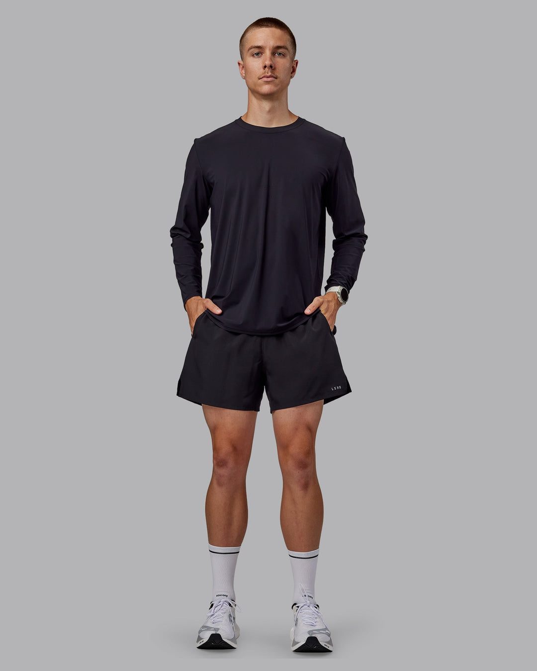 Man wearing Pace 5" Lined Performance Shorts - Black-Retro Blue