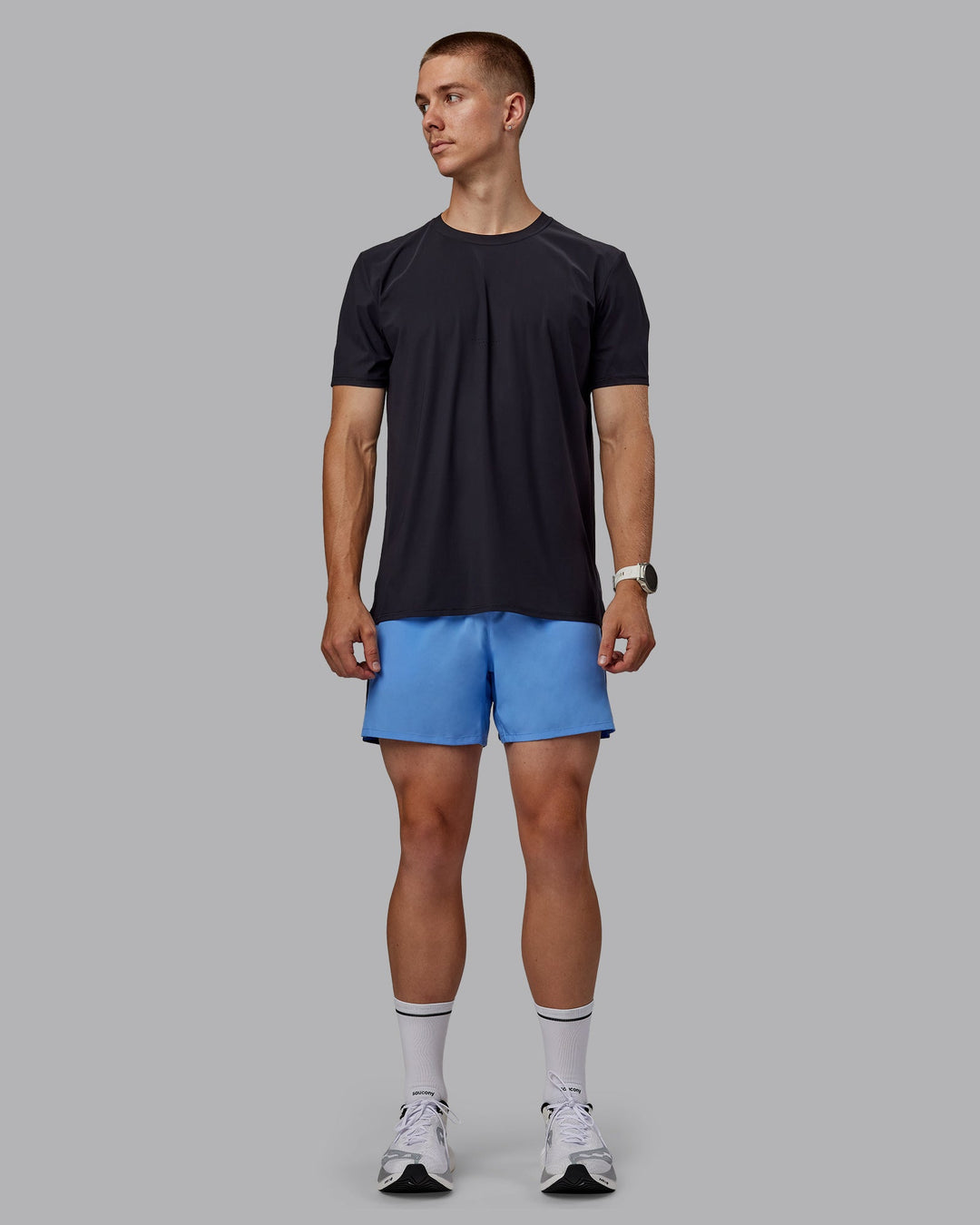 Man wearing Pace 5" Lined Performance Shorts - Midnight Blue-Ultramarine