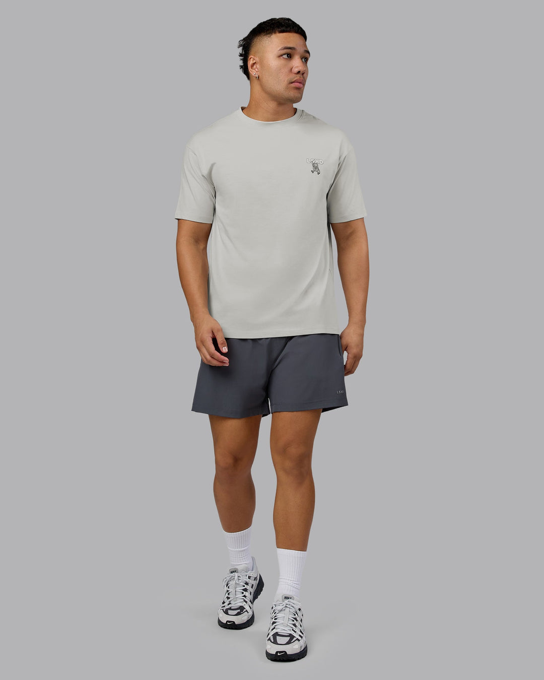Man wearing Perspective FLXCotton Oversized Tee - Digital Mist-White | Model:Kaelyb | Size:L