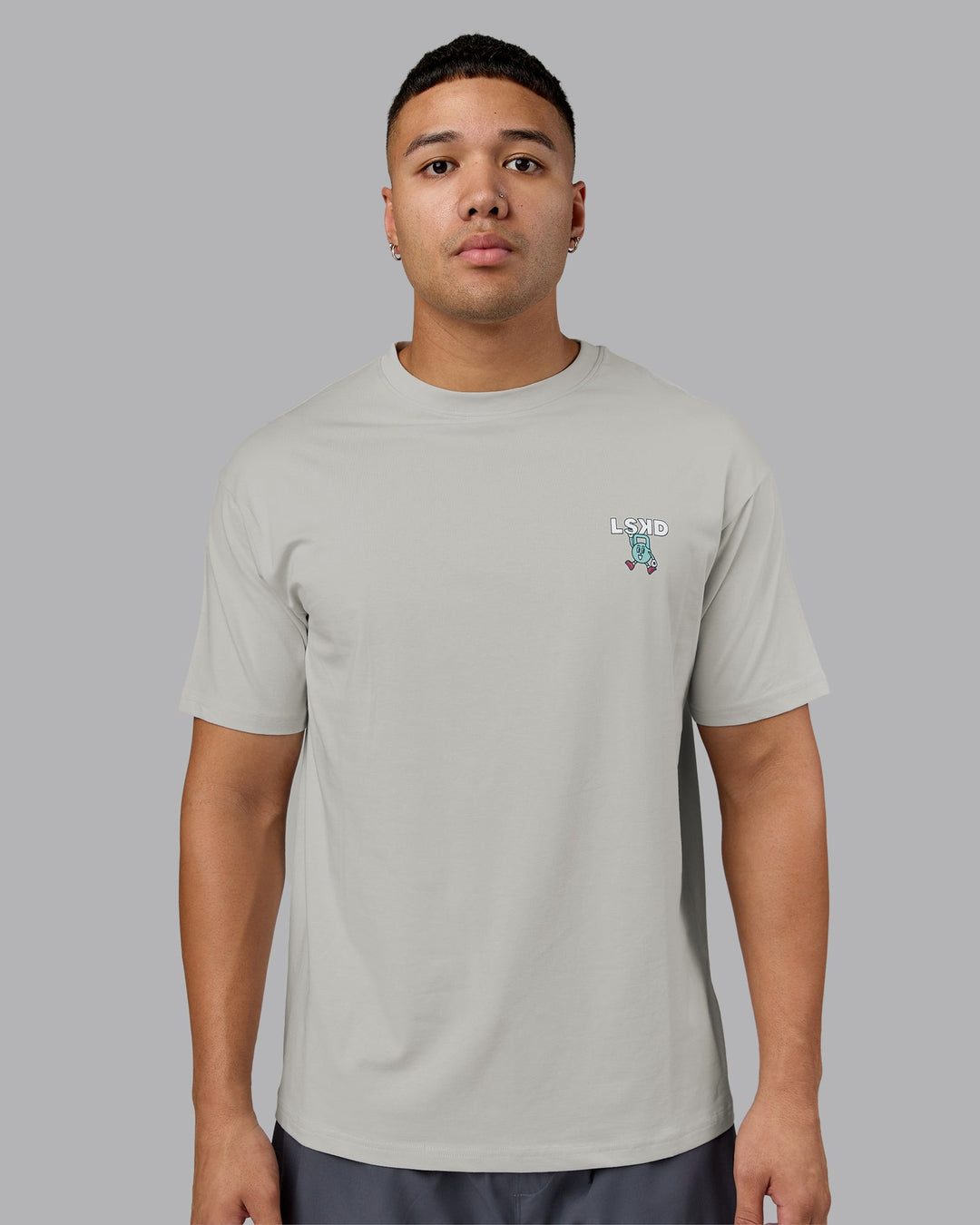 Man wearing Perspective FLXCotton Oversized Tee - Digital Mist-White | Model:Kaelyb | Size:L