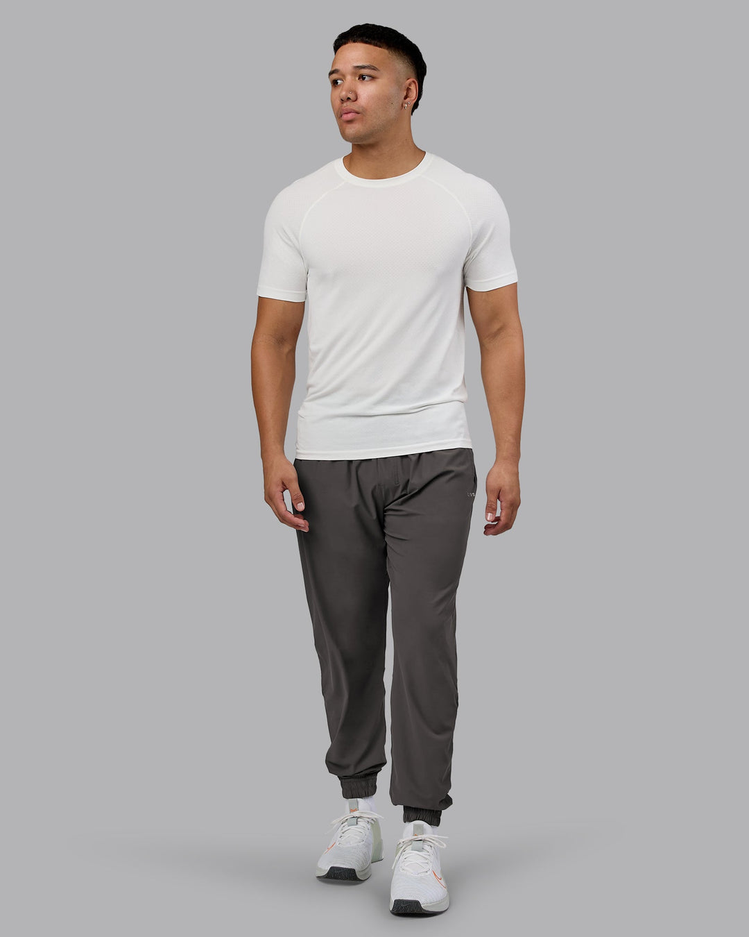 Man wearing Train-Lite FLXMAX Pant - Dark Storm | Model:Kaelyb | Size:L