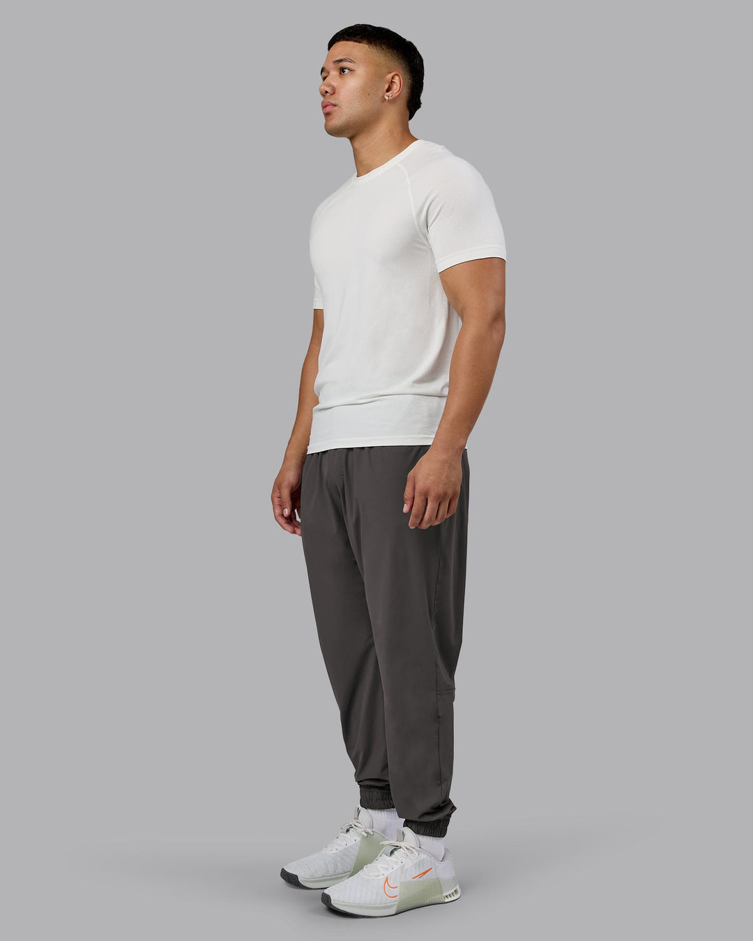 Man wearing Train-Lite FLXMAX Pant - Dark Storm | Model:Kaelyb | Size:L