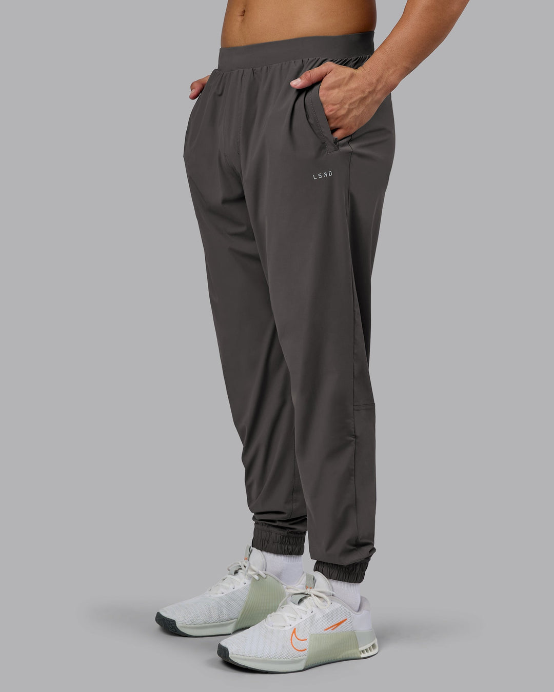 Man wearing Train-Lite FLXMAX Pant - Dark Storm | Model:Kaelyb | Size:L