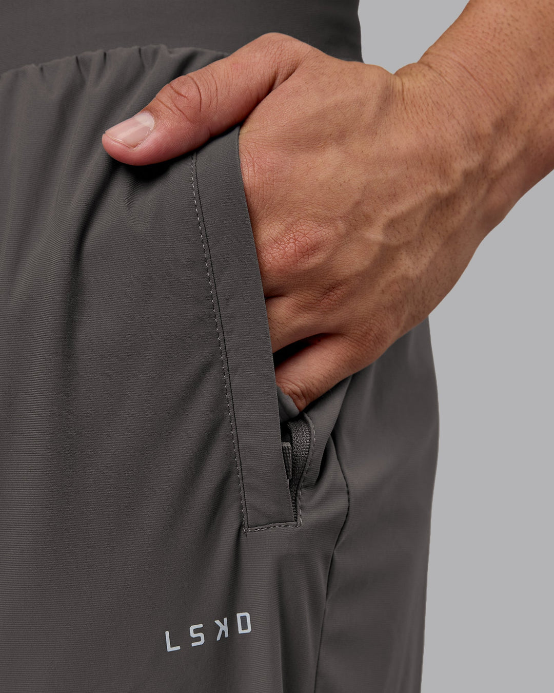 Man wearing Train-Lite FLXMAX Pant - Dark Storm | Model:Kaelyb | Size:L