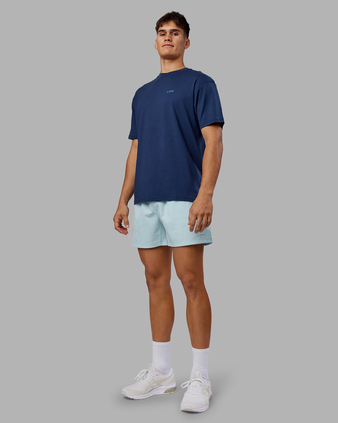 Man wearing Enjoy the Journey Value Series FLXCotton Tee Oversize - Future Navy-Blue Atoll | Model:Jackson | Size:L