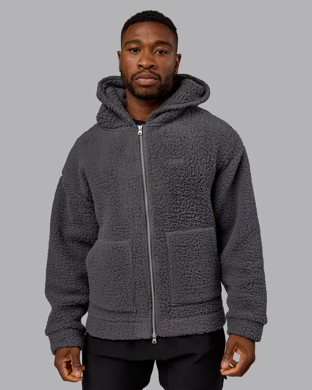 Man wearing Sherpa Oversized Jacket - Dark Storm | Model:Sam | Size:L