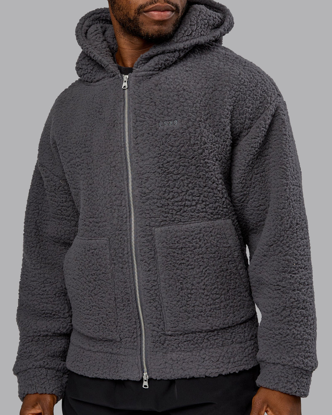 Man wearing Sherpa Oversized Jacket - Dark Storm | Model:Sam | Size:L