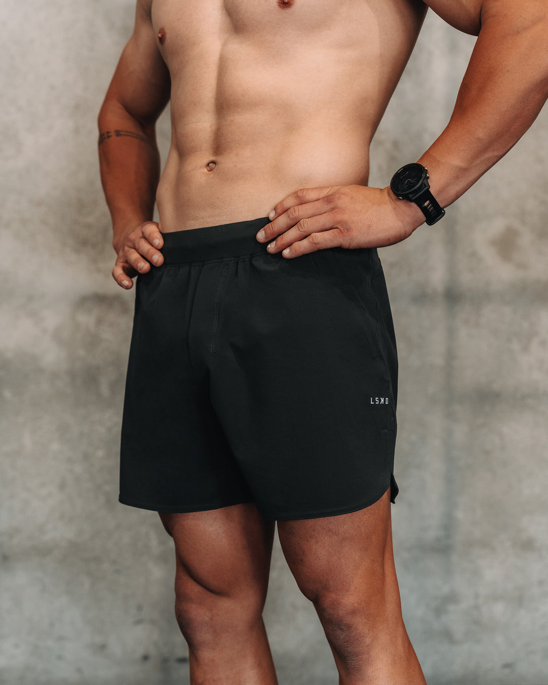 Man wearing Lift 6" Short - Pirate Black | Model:| Size:M