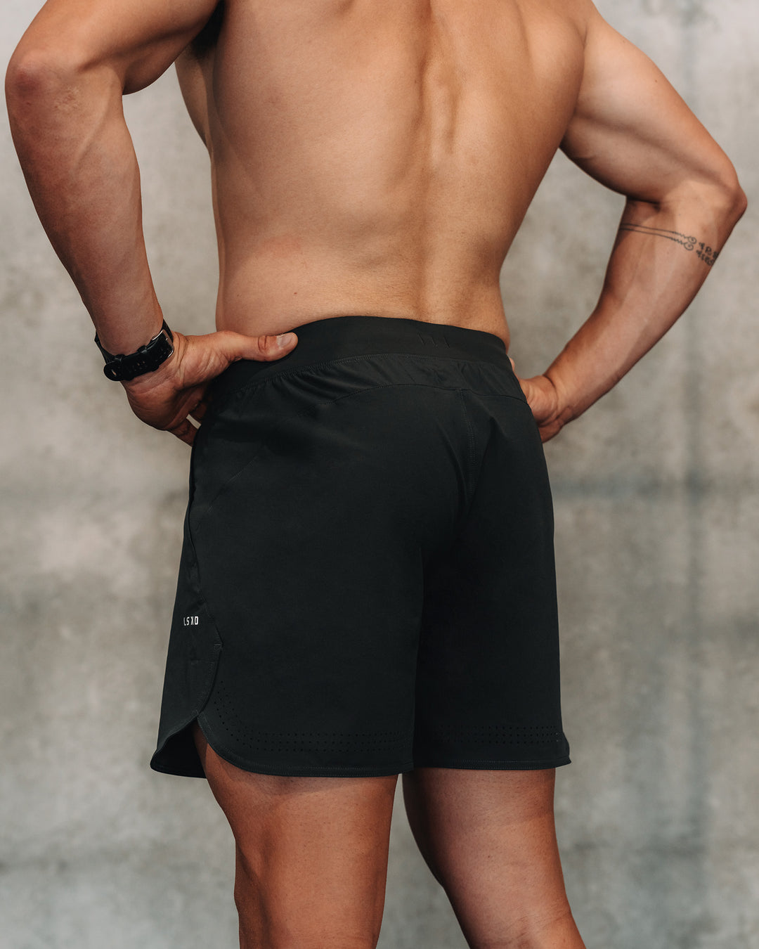 Man wearing Lift 6" Short - Pirate Black | Model:| Size:M