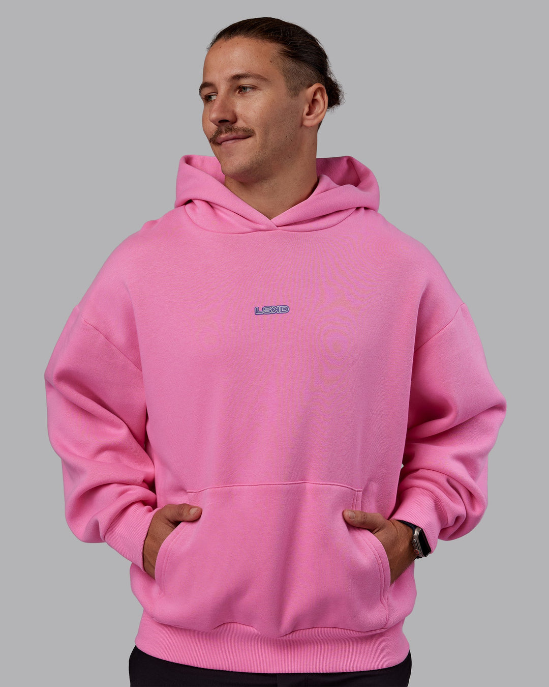 Man wearing CFT BNE 25 Oversized Hoodie - Candy Pink-Purple Opulence | Model:Jaiden | Size:M