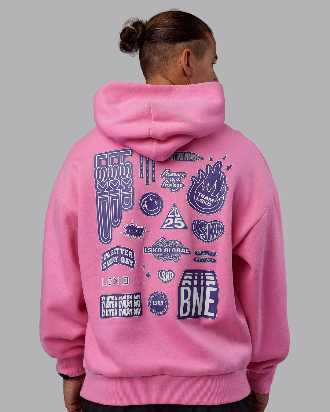 Man wearing CFT BNE 25 Oversized Hoodie - Candy Pink-Purple Opulence | Model:Jaiden | Size:M
