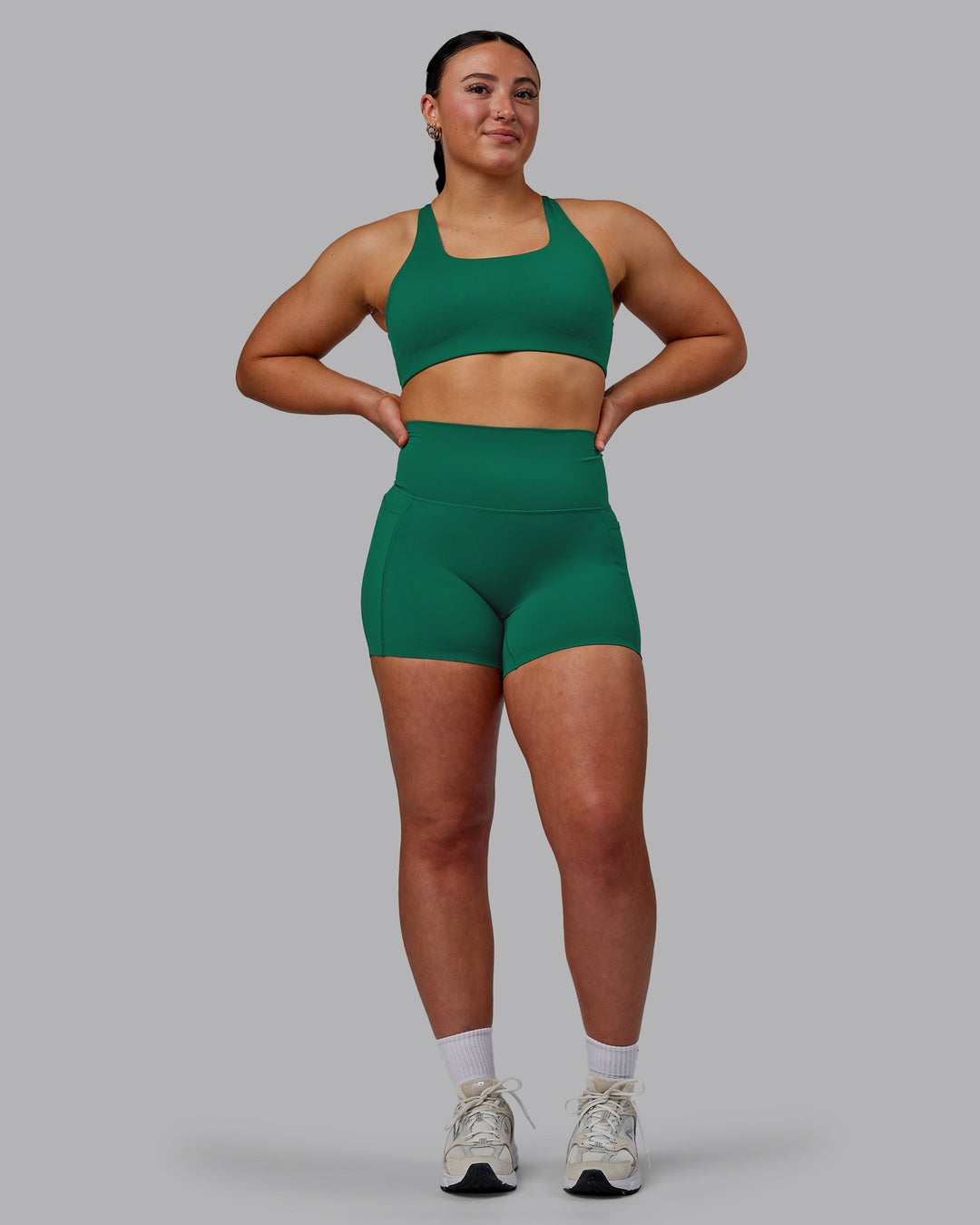 Woman wearing Elixir Ultra High-Rise 4" Short Pockets - Malachite