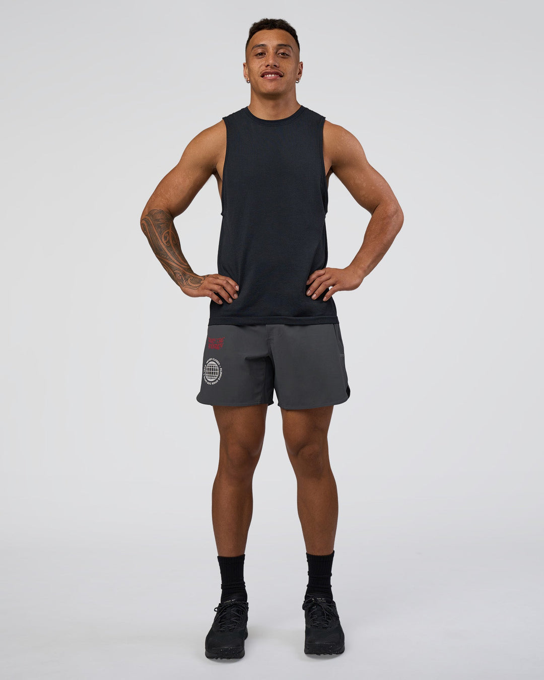 Man wearing Lift 6" Short - Dark Storm-Scarlet | Model:Daarian | Size:M