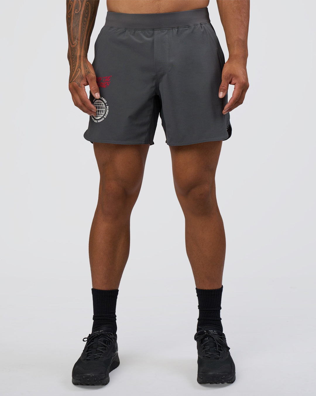 Man wearing Lift 6" Short - Dark Storm-Scarlet | Model:Daarian | Size:M