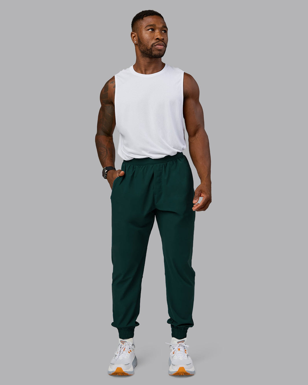 Man wearing Train-Lite FLXMAX Pant - Dark Moss | Model:Sam | Size:L