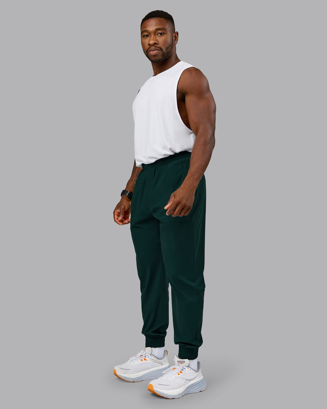 Man wearing Train-Lite FLXMAX Pant - Dark Moss | Model:Sam | Size:L