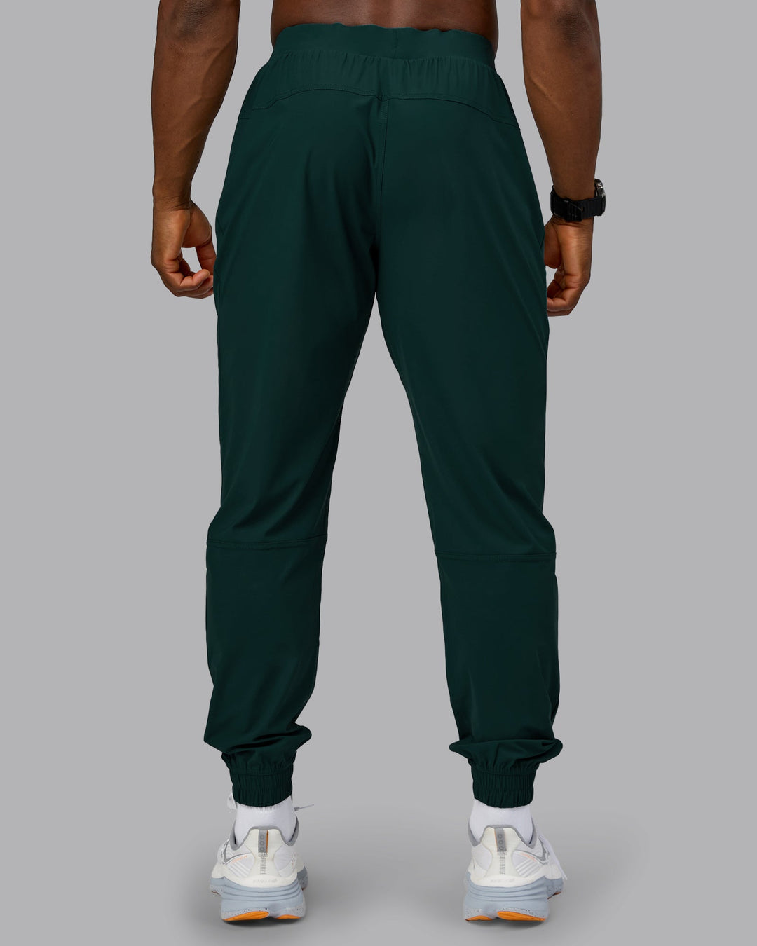 Man wearing Train-Lite FLXMAX Pant - Dark Moss | Model:Sam | Size:L