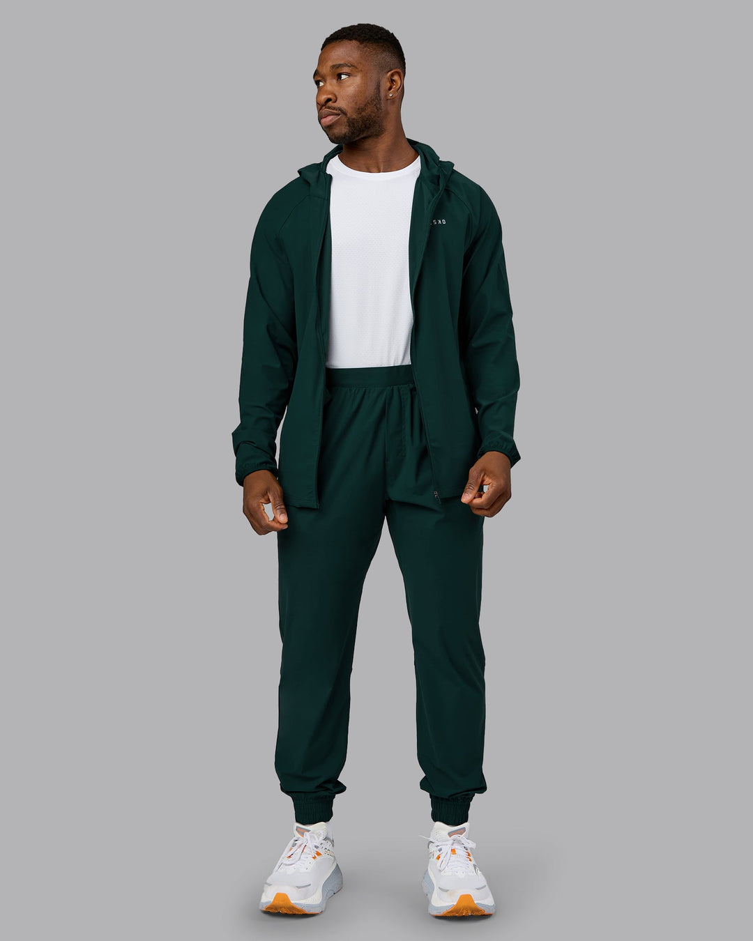 Man wearing Train-Lite FLXMAX Pant - Dark Moss | Model:Sam | Size:L