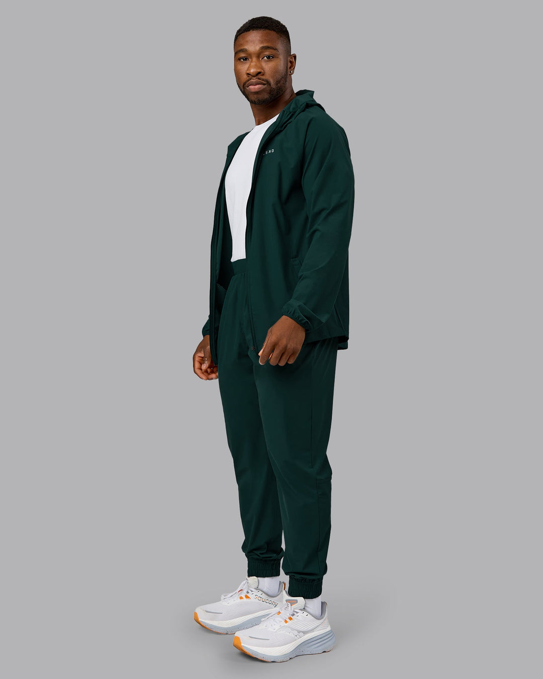 Man wearing Train-Lite FLXMAX Pant - Dark Moss | Model:Sam | Size:L