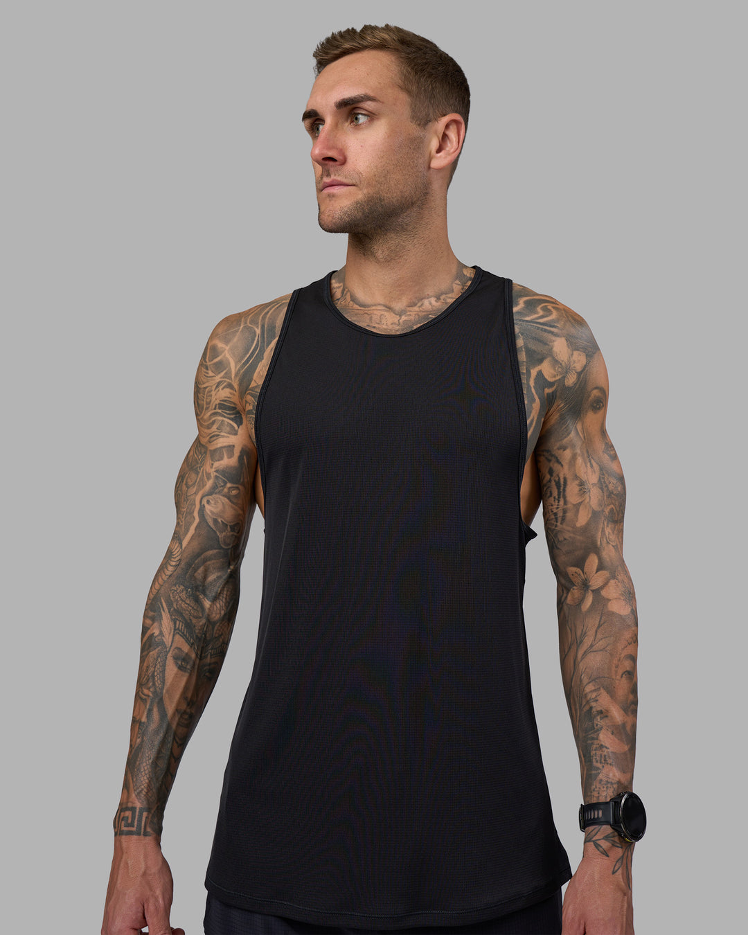 Man wearing Pace Running Tank - Black | Model:Tommy | Size:M