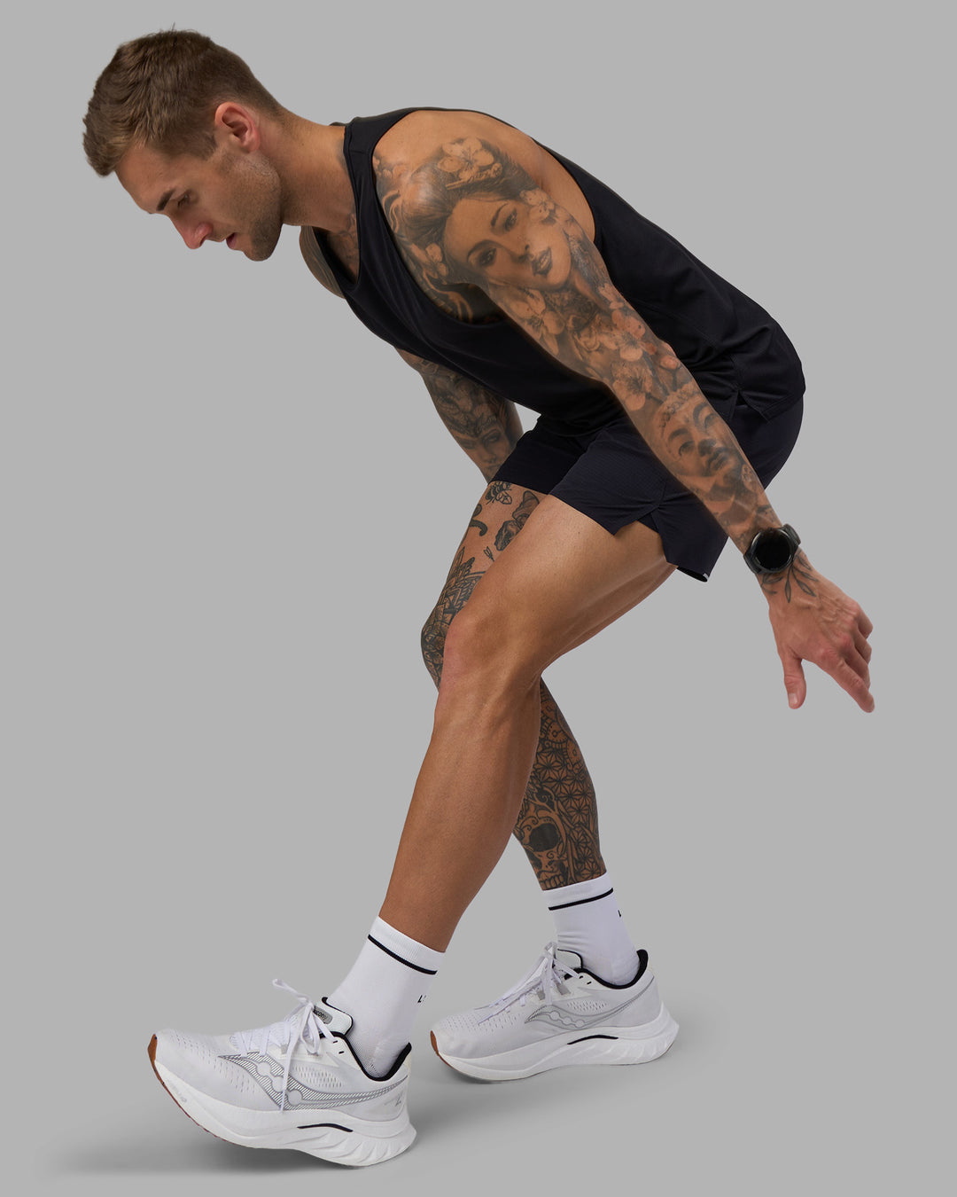 Man wearing Pace Running Tank - Black | Model:Tommy | Size:M