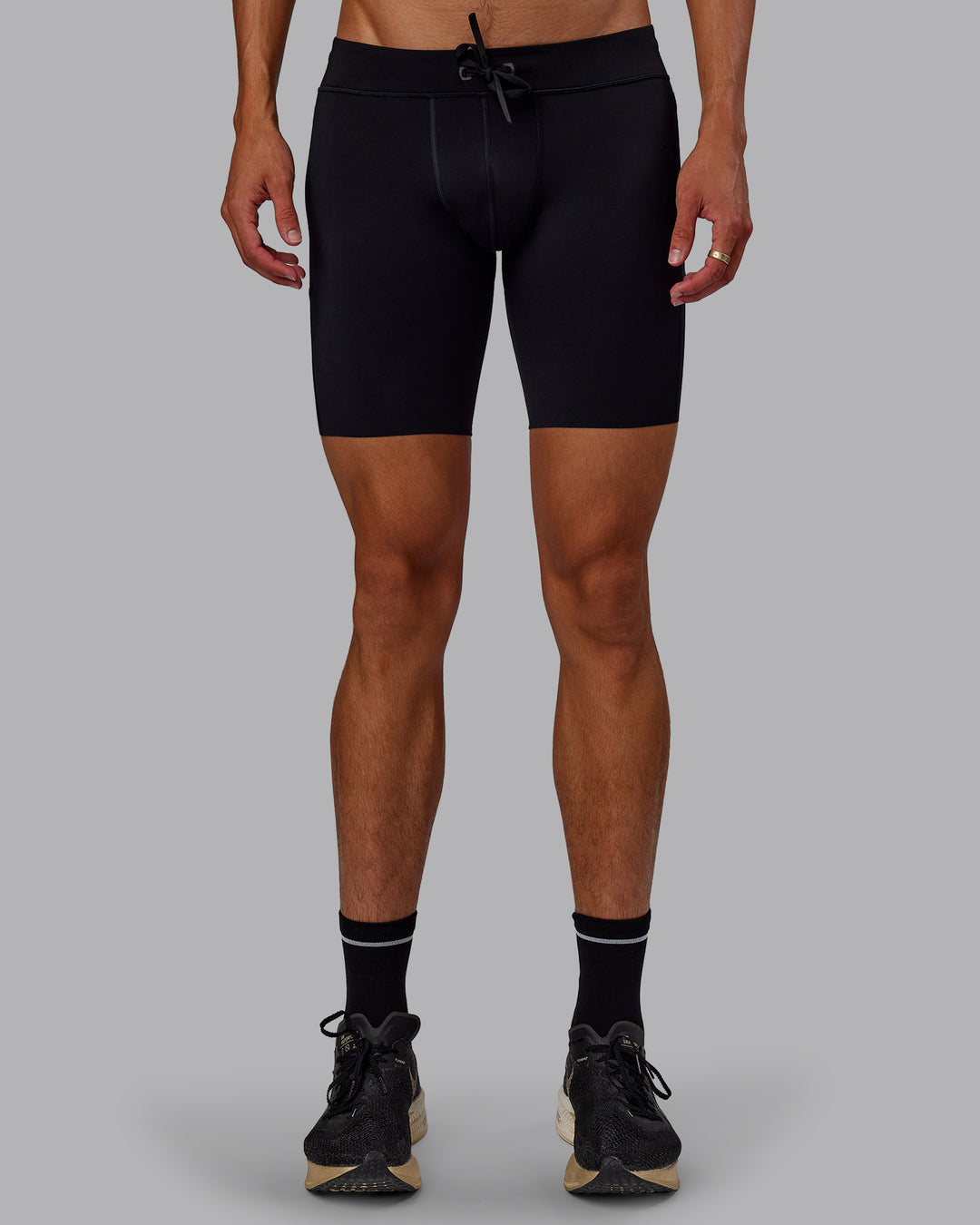 Man wearing Race Day Short Tight 8" in Black | Model:Jaxon | Size:M