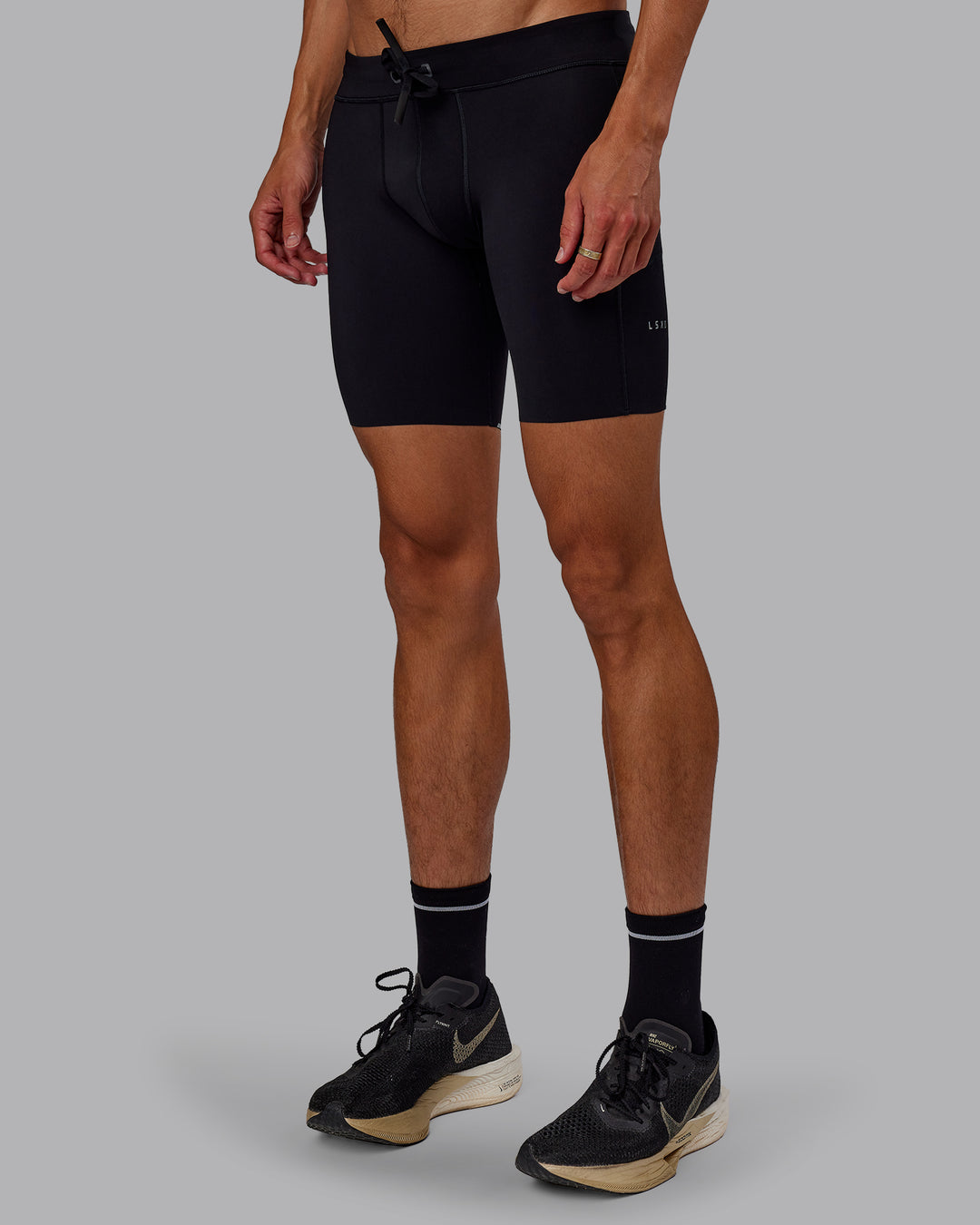 Man wearing Race Day Short Tight 8" in Black | Model:Jaxon | Size:M