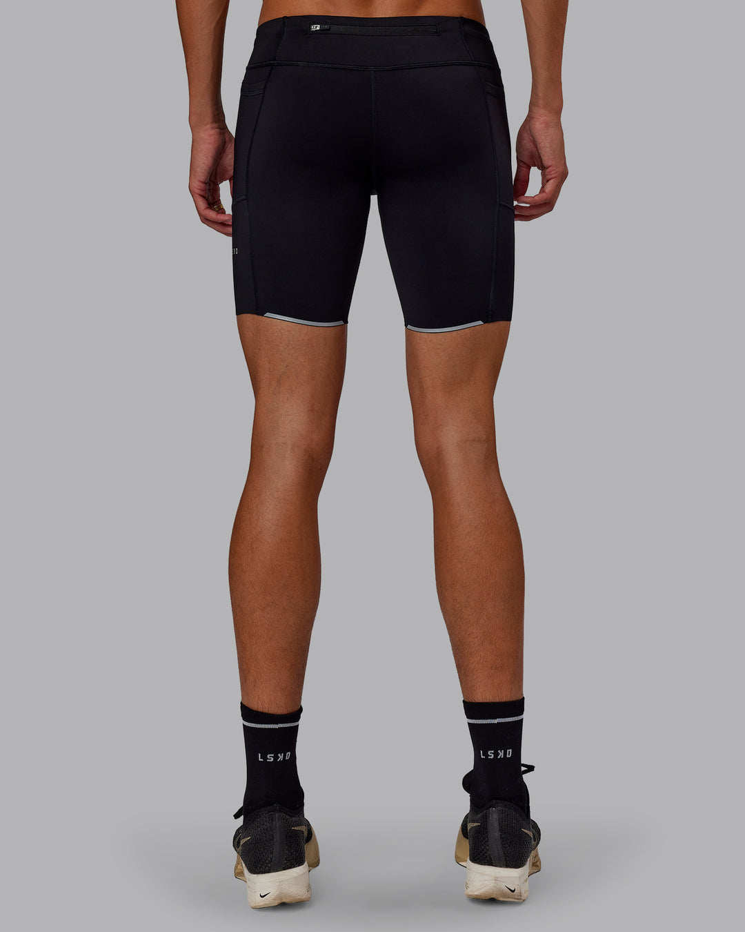 Man wearing Race Day Short Tight 8" in Black | Model:Jaxon | Size:M