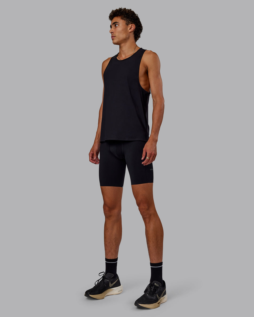 Man wearing Race Day Short Tight 8" in Black | Model:Jaxon | Size:M
