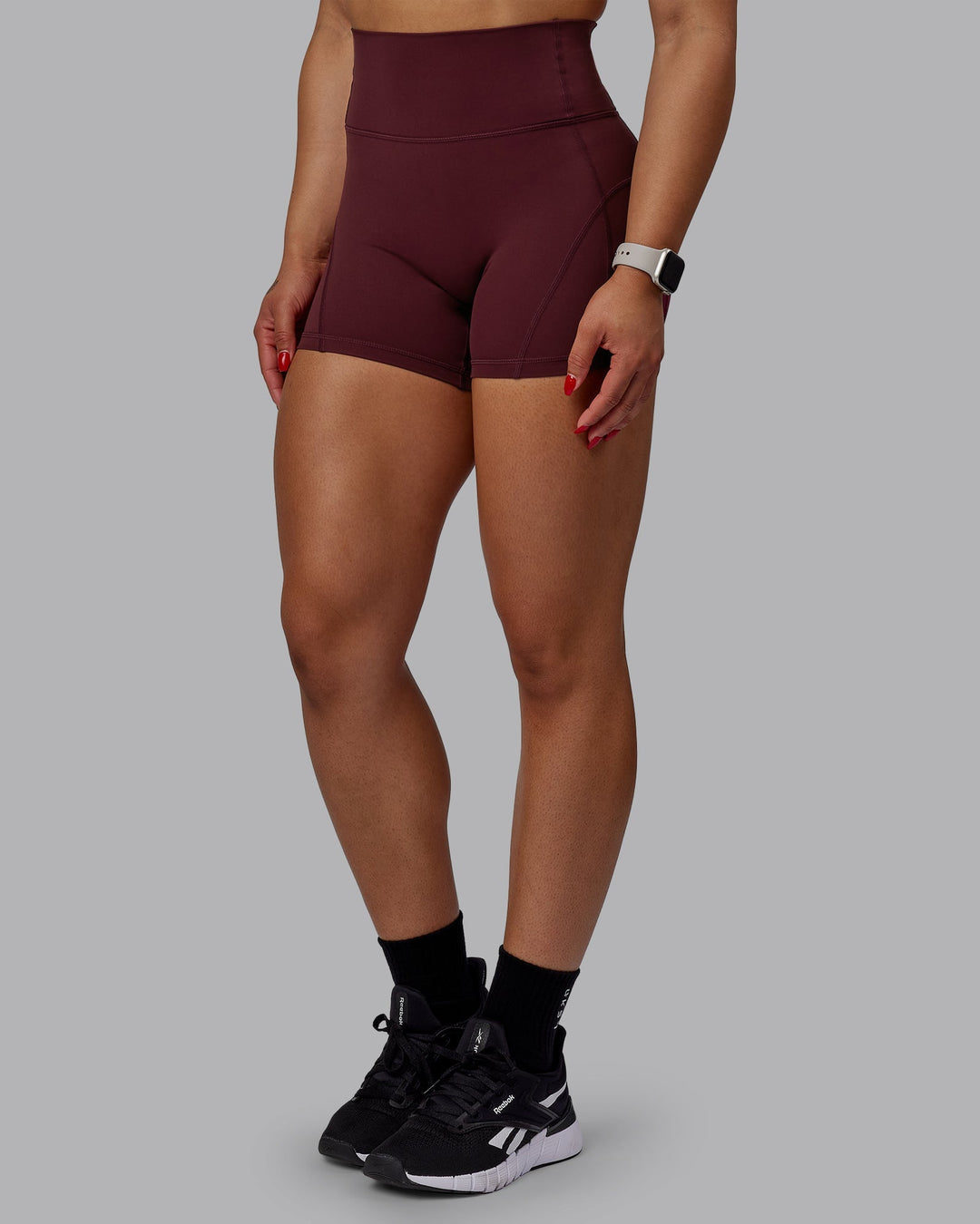 Woman wearing Bend Ultra High-Rise 4" Short - Dark Cherry