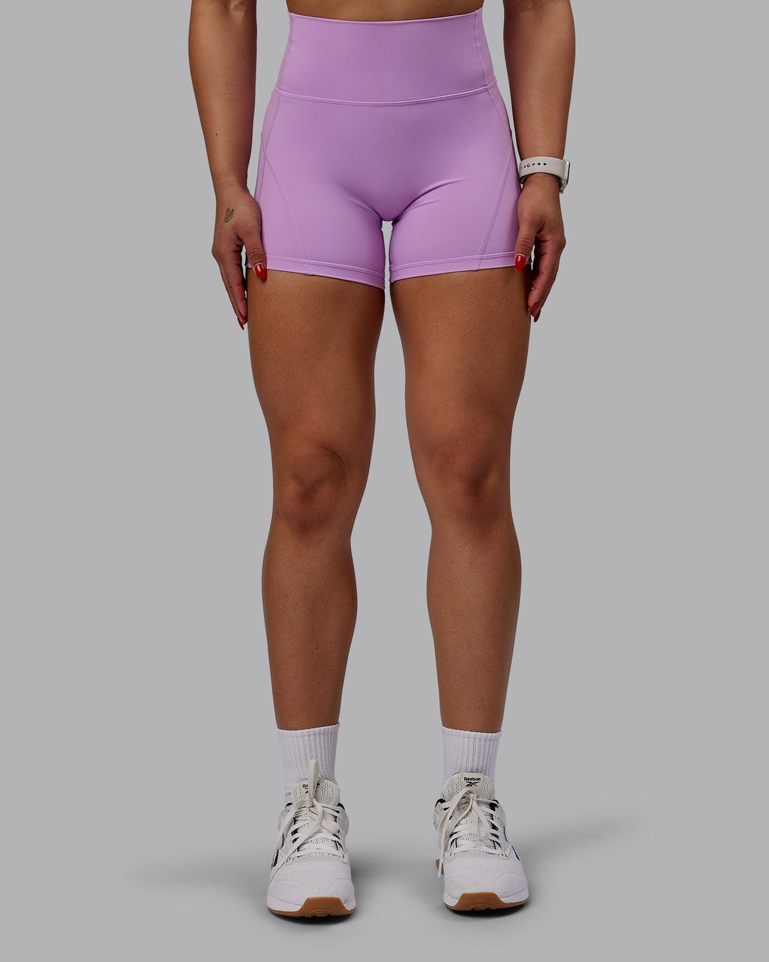Woman wearing Bend Ultra High-Rise 4" Short - Light Violet