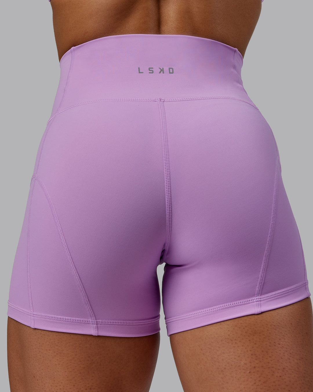 Woman wearing Bend Ultra High-Rise 4" Short - Light Violet