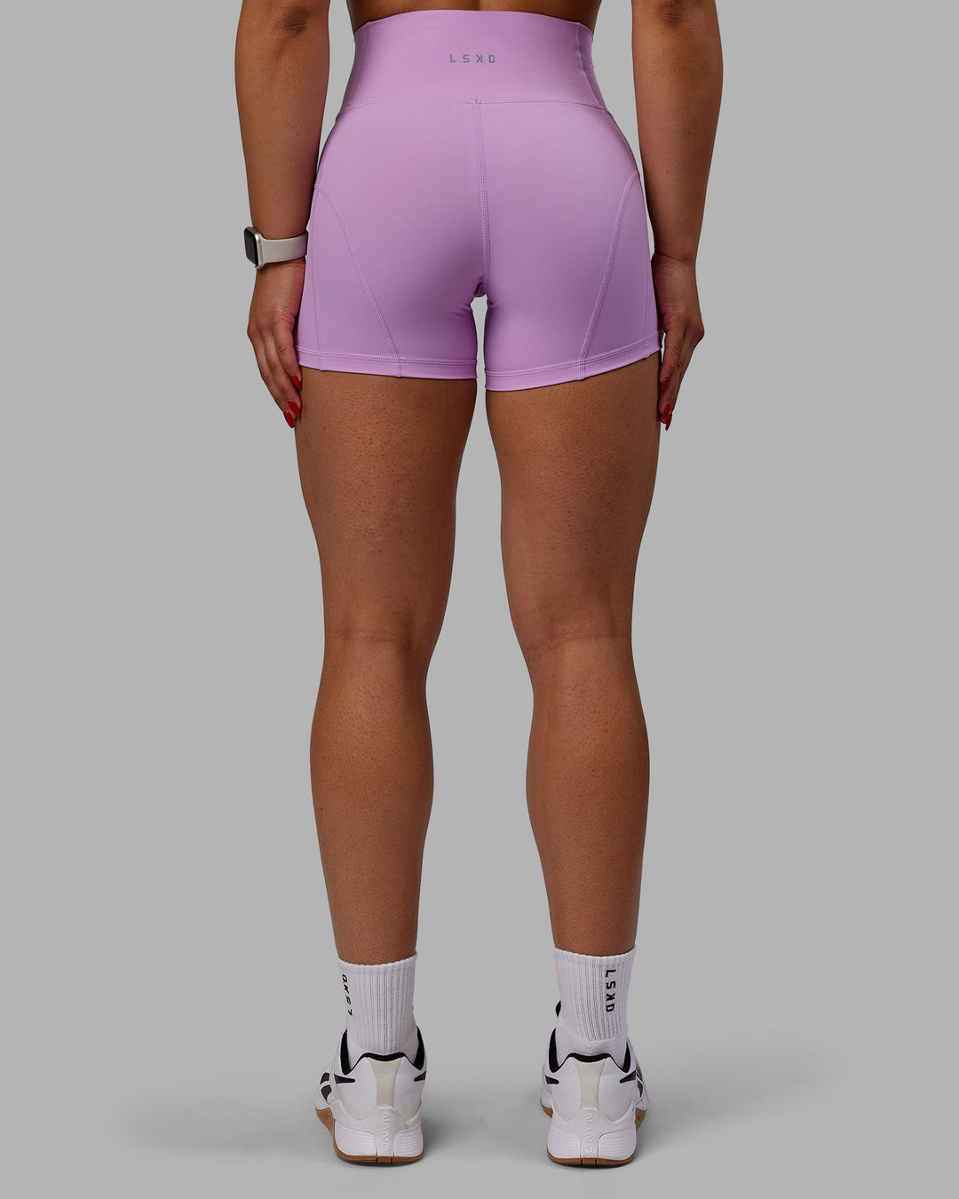 Woman wearing Bend Ultra High-Rise 4" Short - Light Violet