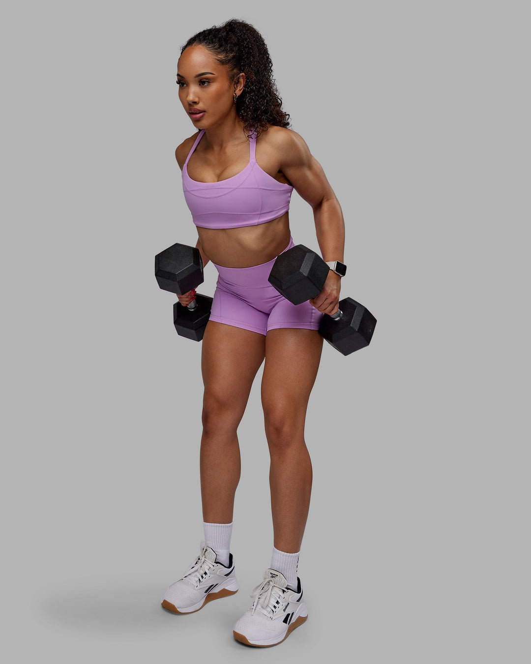 Woman wearing Bend Ultra High-Rise 4" Short - Light Violet