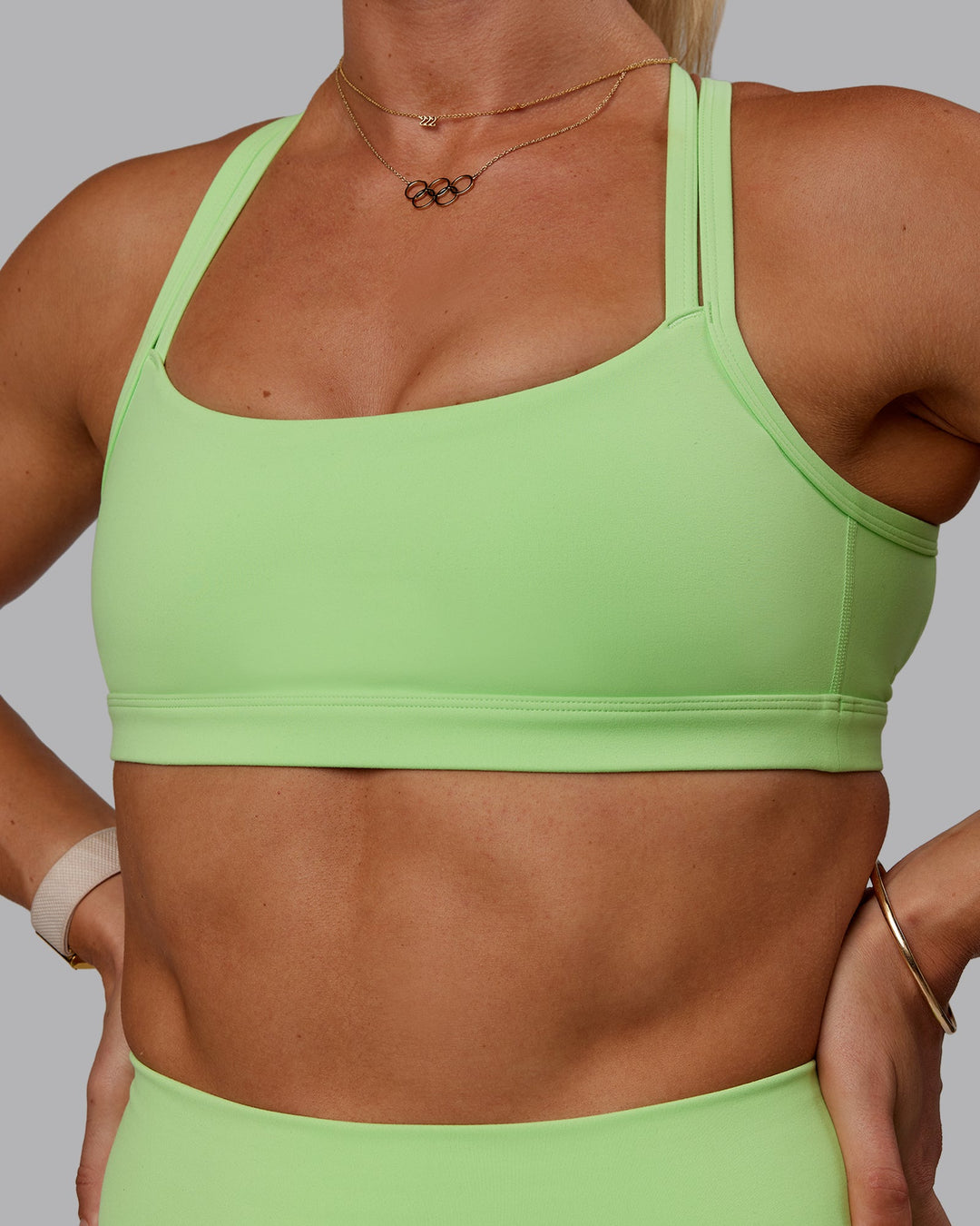 Woman wearing Bree Masters Velocity Sports Bra - Pastel Lime