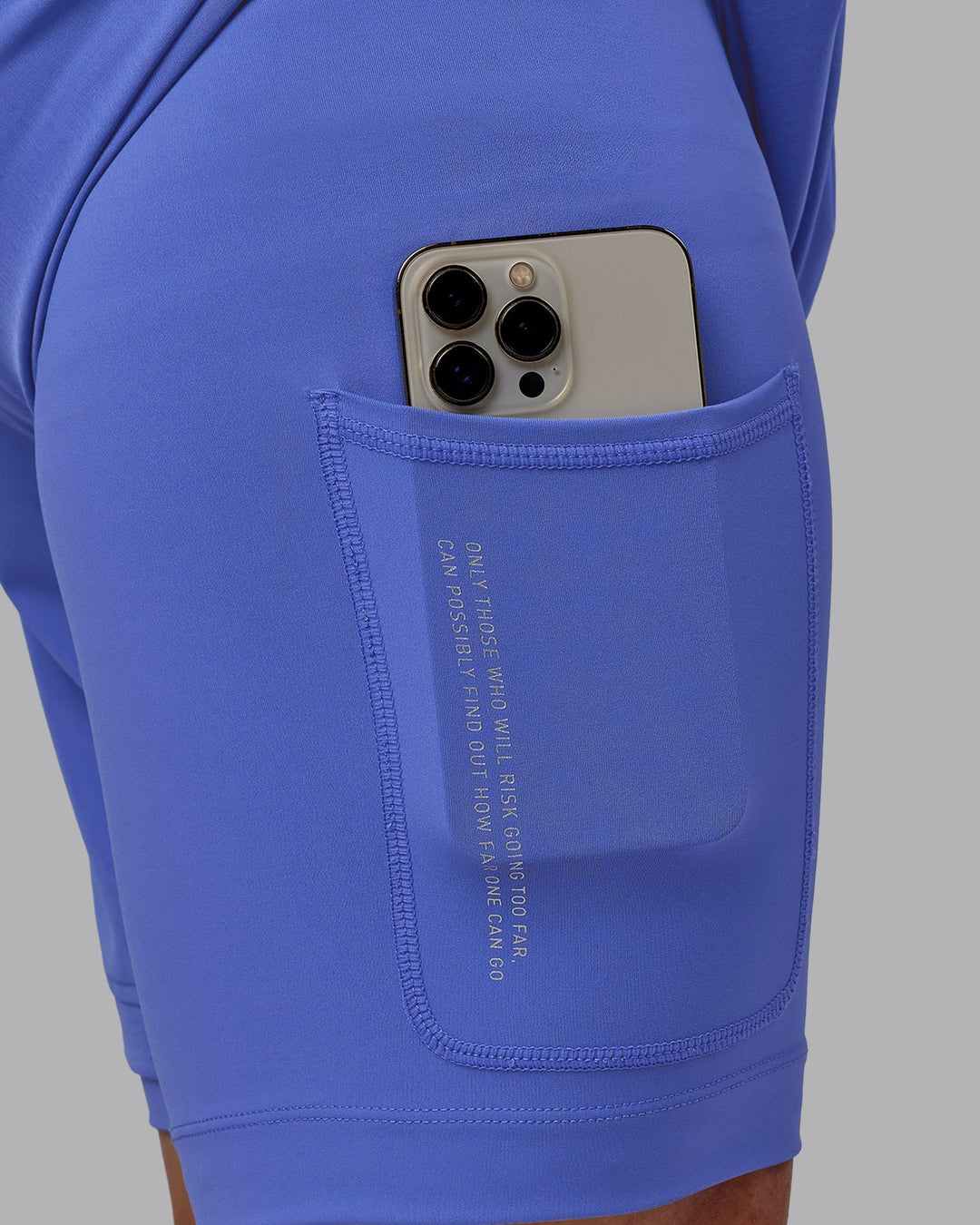 Man wearing Challenger 6" Lined Performance Shorts - Baja Blue