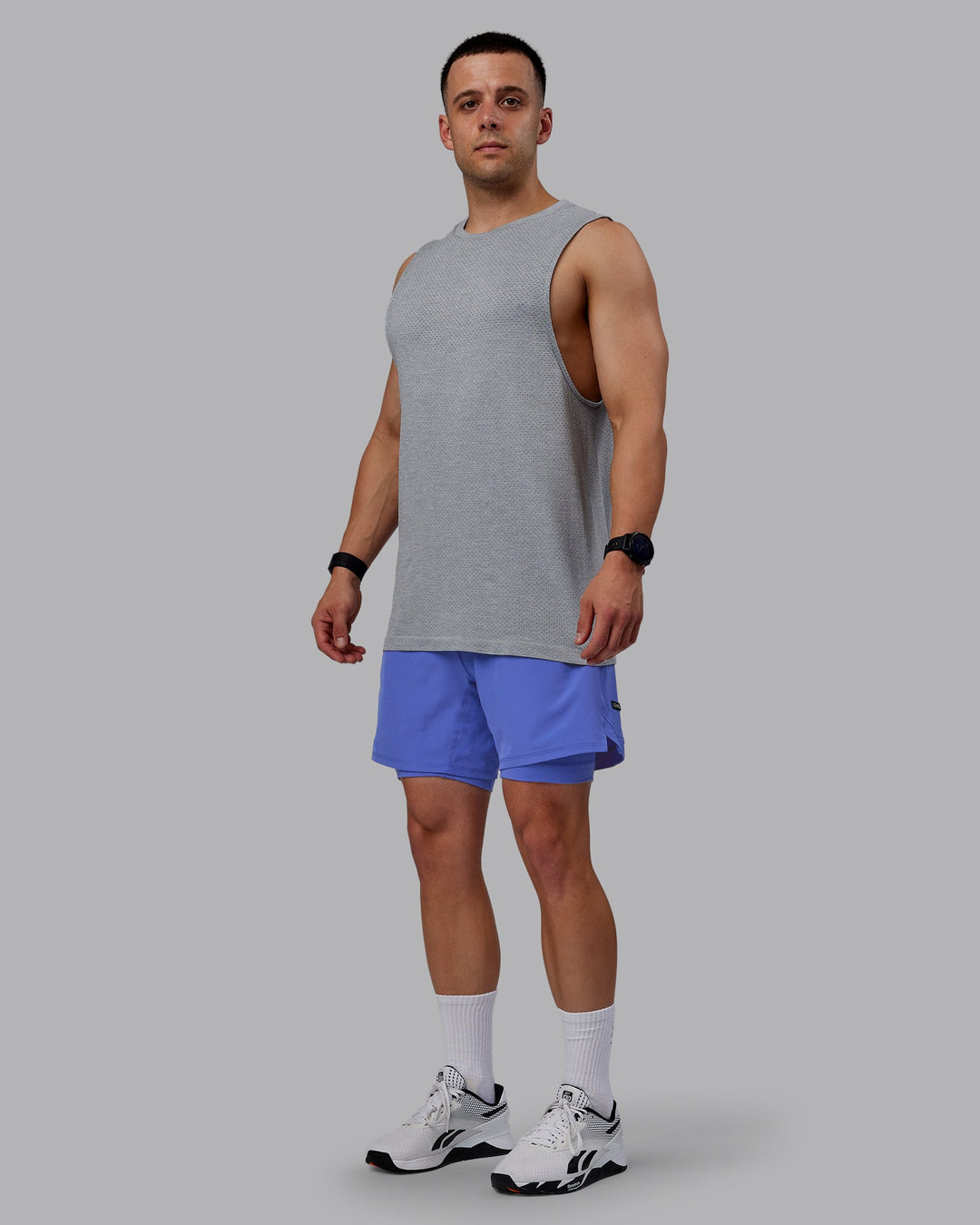 Man wearing Challenger 6" Lined Performance Shorts - Baja Blue