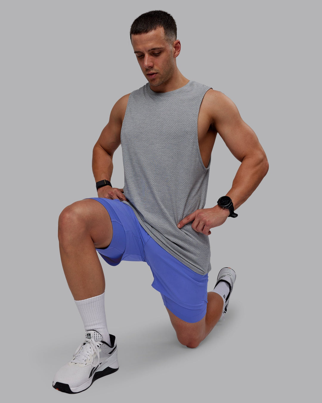 Man wearing Challenger 6" Lined Performance Shorts - Baja Blue