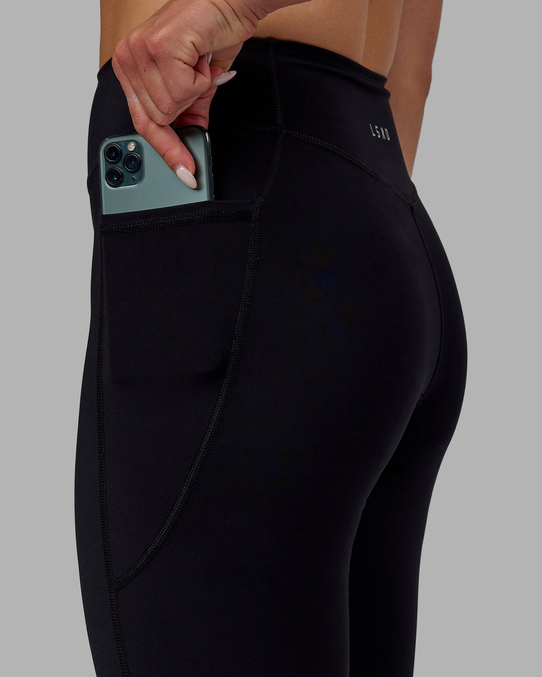 Woman wearing Elite High-Rise Full Length Legging Pockets - Black