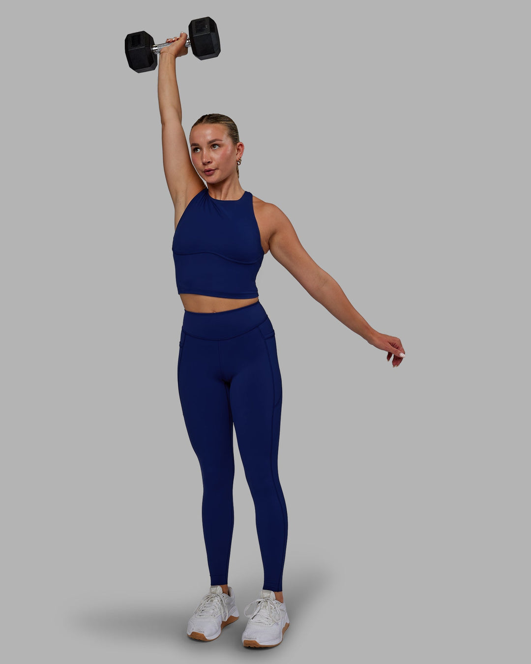 Woman wearing Elite High-Rise Full Length Legging Pockets - Midnight Blue