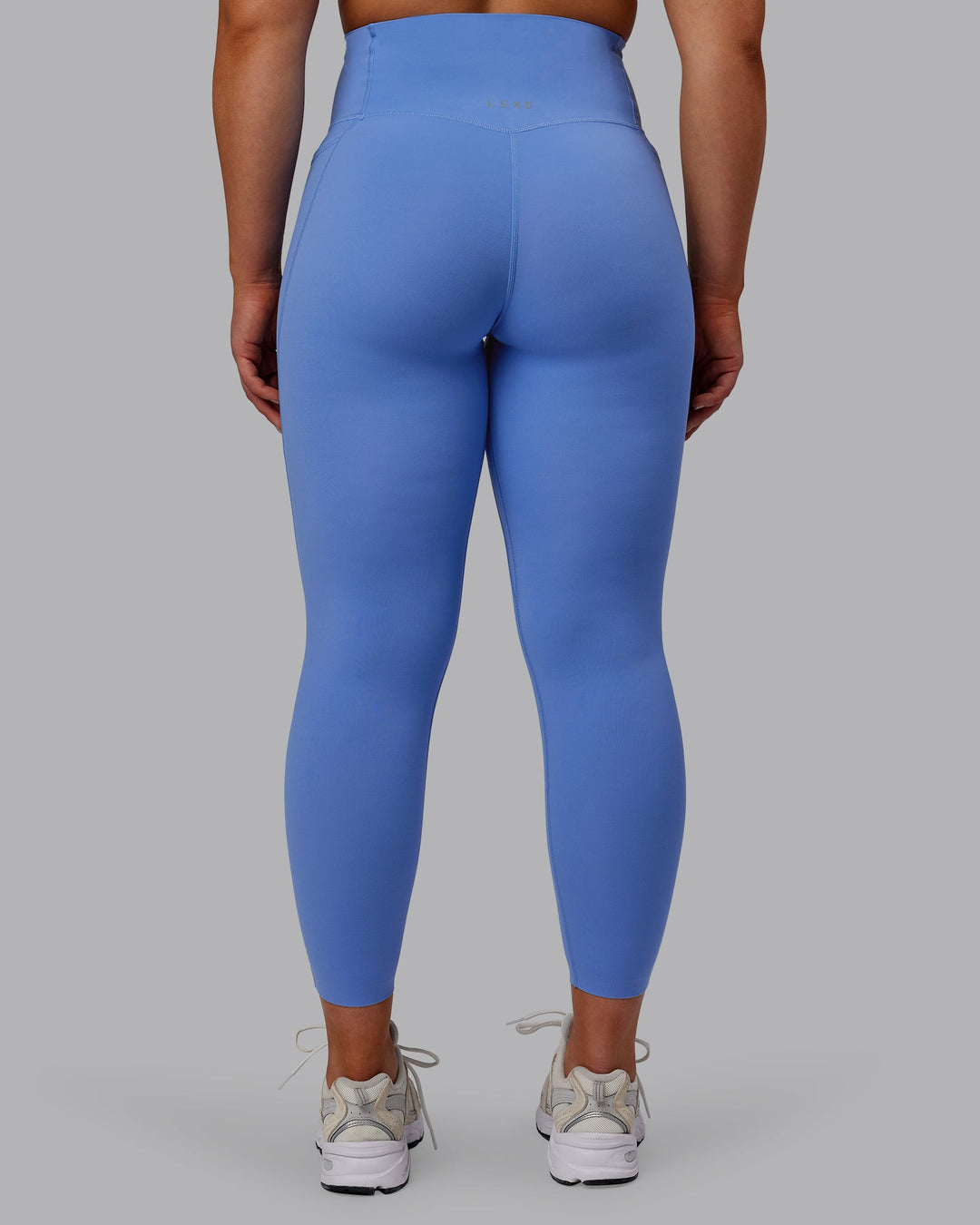 Woman wearing Elixir Ultra High-Rise 7/8 Legging Pockets - Ultramarine