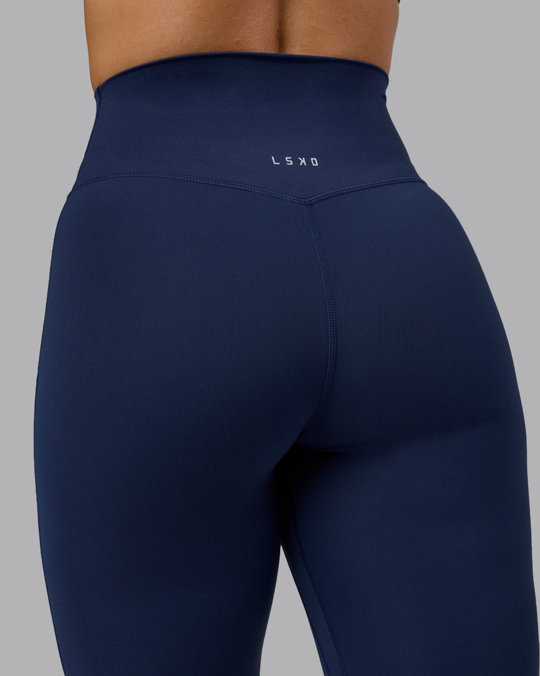 Woman wearing Elixir Ultra High-Rise Full Length Leggings - Future Navy